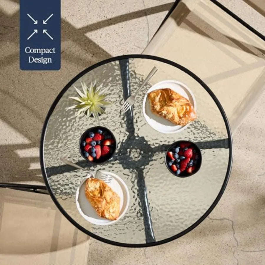 3-Piece Patio Bistro Dining Furniture Set w/Textured Glass Tabletop 2 Steel Folding Chairs Polyester Fabric - Beige